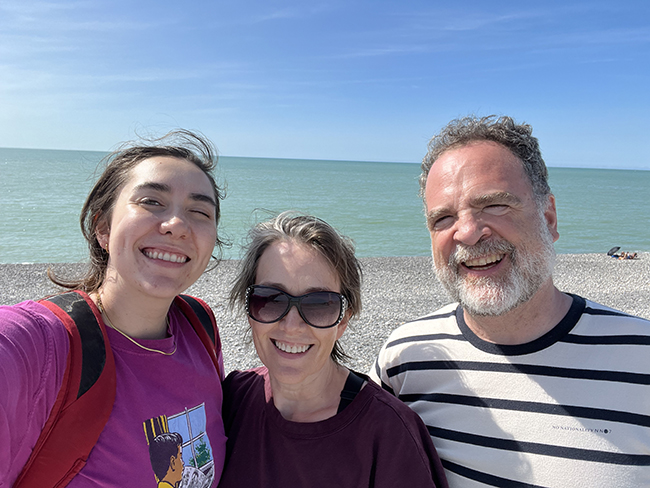 Yahne with her family on the beach in France.