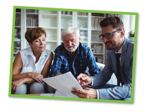 Senior couple planning their investments with financial advisor